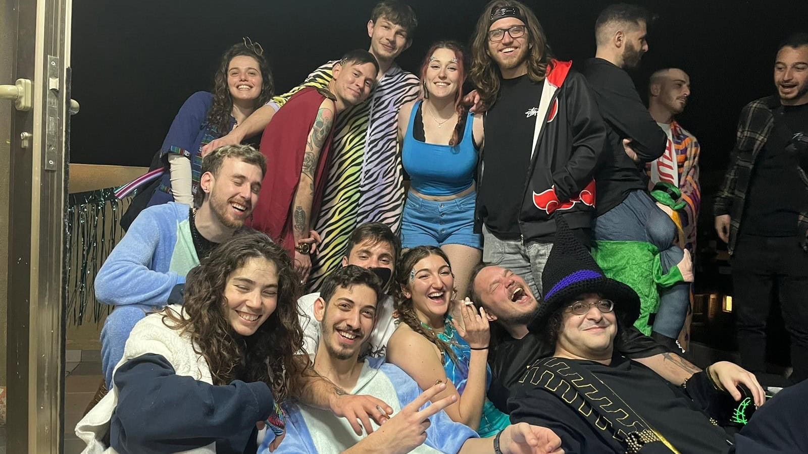 Natalie Selvin, in blue, with guests at a Purim party she and a friend hosted to the soundtrack of EDM music such as dubstep, drum and bass, trance/psytrance and hardstyle. Photo courtesy of Natalie Selvin