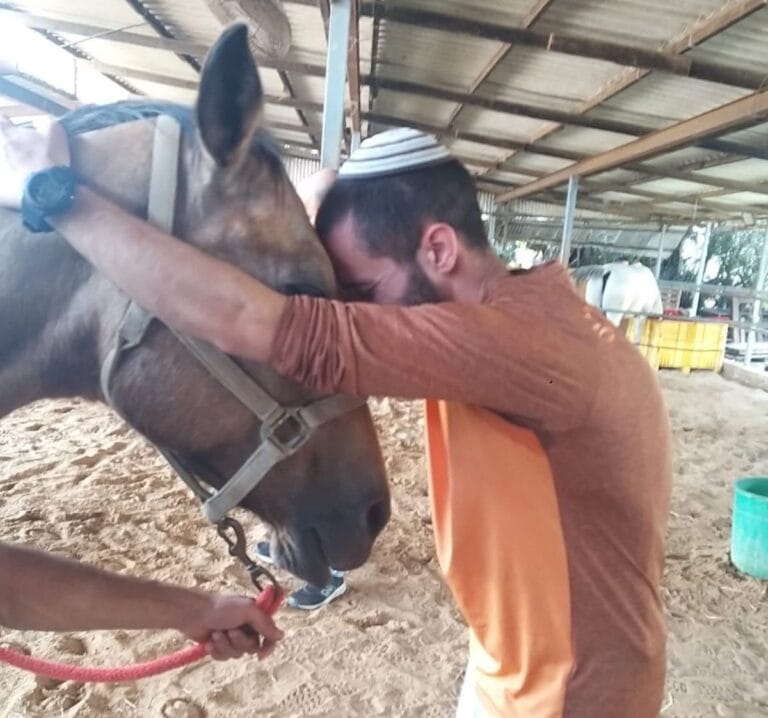 Soldiers straight from the battlefield can benefit from equine therapy. Photo courtesy of Transcending Trauma