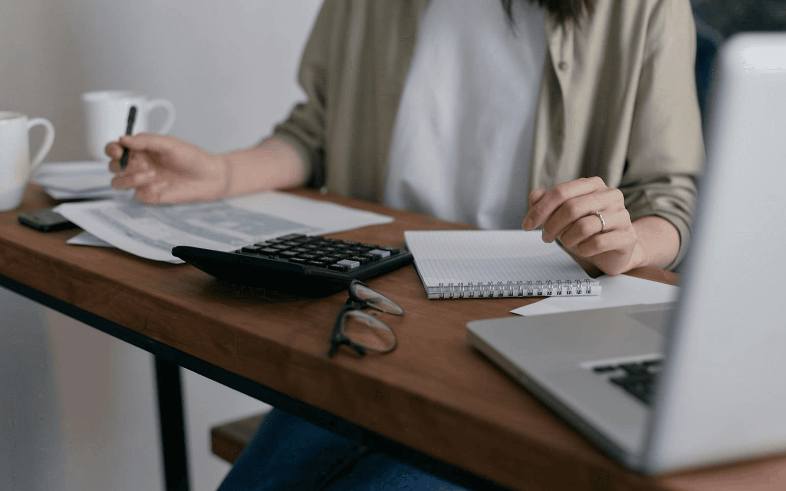 Perhaps this woman is lamenting over sexist financial advice she’s been given. Photo by Mikhail Nilov/Pexels