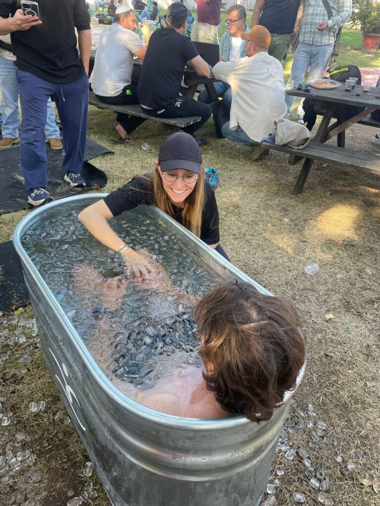 Nikia Blumenthal at a Chayal’s Angels treatment day, supervising an ice bath for a soldier who’d just gotten out of Lebanon. Photo courtesy of Nikia Blumenthal