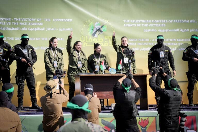 Hamas hands over four female hostages to the Red Cross in the Palestine Square, in Gaza City Photo by Khalil Kahlout/Flash90