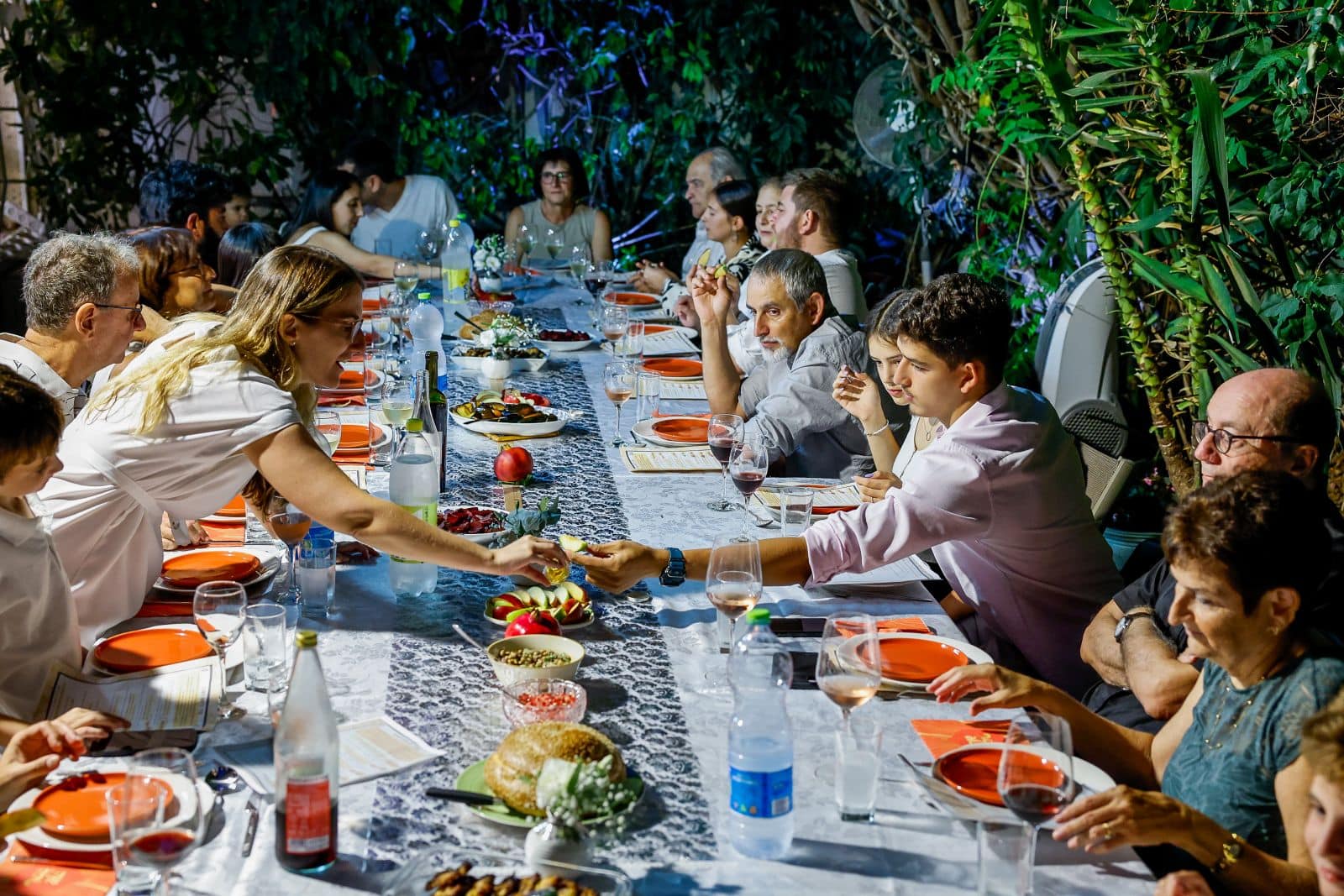 Strong relationships with family and friends are at the heart of what makes Israelis happy. An Israeli family celebrates Rosh Hashana in Ra’anana. Photo by Nati Shohat/Flash90