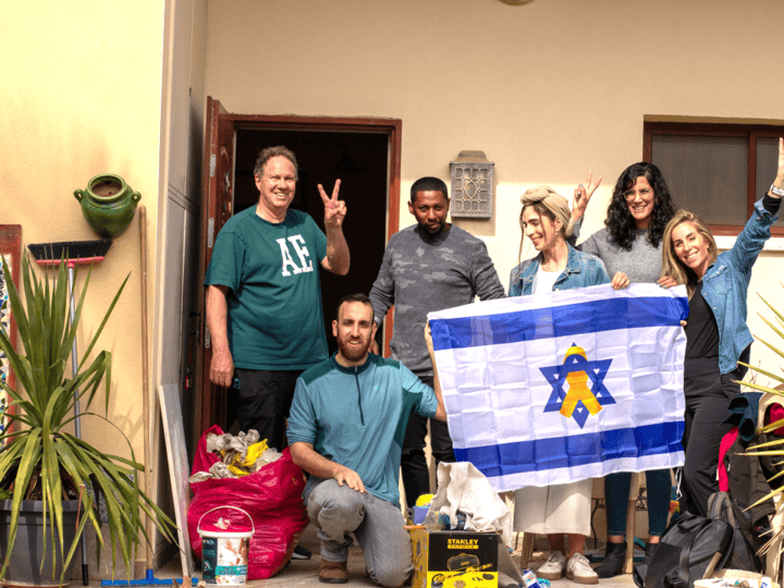 Residents of Kibbutz Nirim who have come back to rebuild their destroyed homes. Photo courtesy of Kibbutz Movement