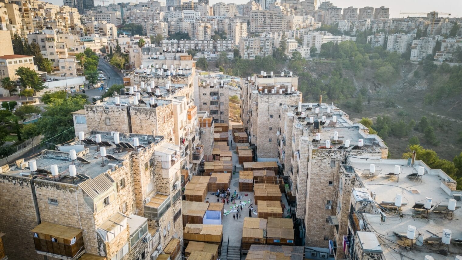 A street full of Sukkot, in the religious neighborhood of Sorotzkin in Jerusalem on October 15, 2024. Photo by Chaim Goldberg/Flash90