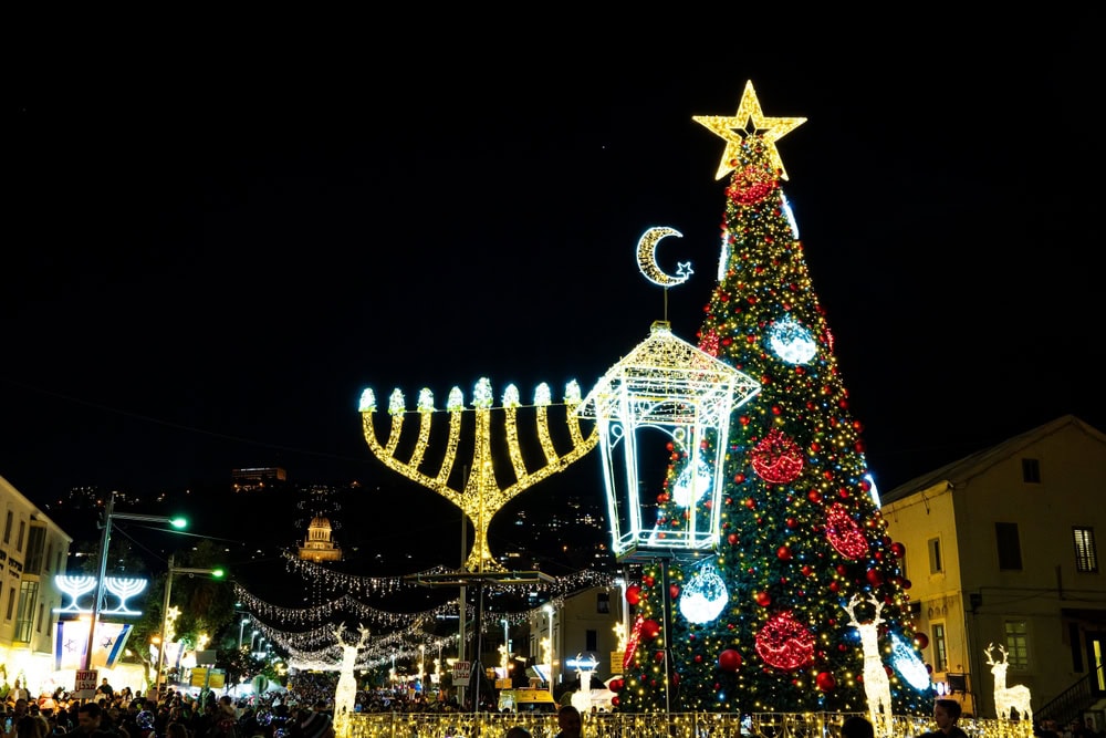 At the Holiday of Holidays in Haifa, you will find the symbols of the world’s three main religions. Photo taken in Haifa on 21.12.24 by Teo-k, via Shutterstock