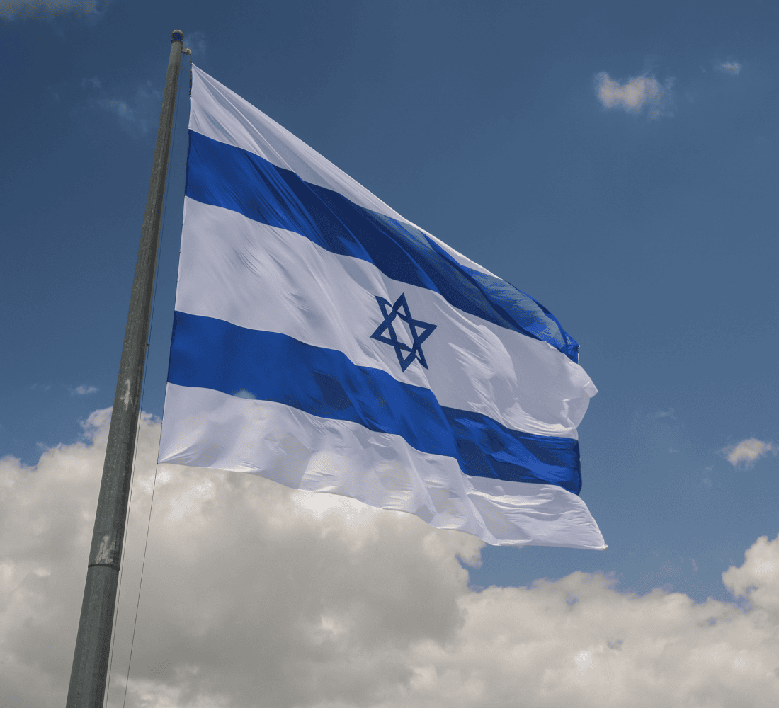 Israel’s flag features the Star of David and two blue stripes. Photo by Michaell Giladi/ Flash90