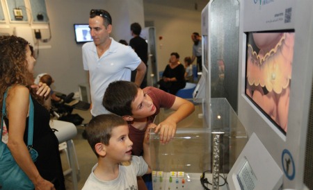 Visitors watch how the PillCam shows doctors what's going on in the gut. Photo courtesy of Bloomfield Science Museum